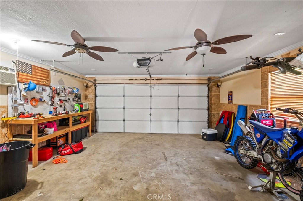 24847 Split Rail Road Wildomar, CA 92595 - Photo 28 of 45 a view of a garage with storage