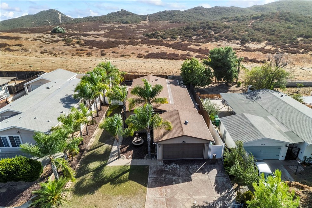 24847 Split Rail Road Wildomar, CA 92595 - Photo 34 of 45 an aerial view of residential house and green space
