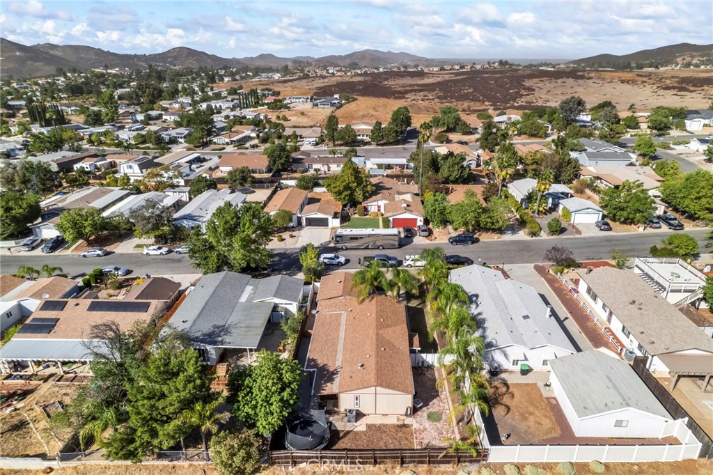 24847 Split Rail Road Wildomar, CA 92595 - Photo 36 of 45 an aerial view of residential houses with outdoor space