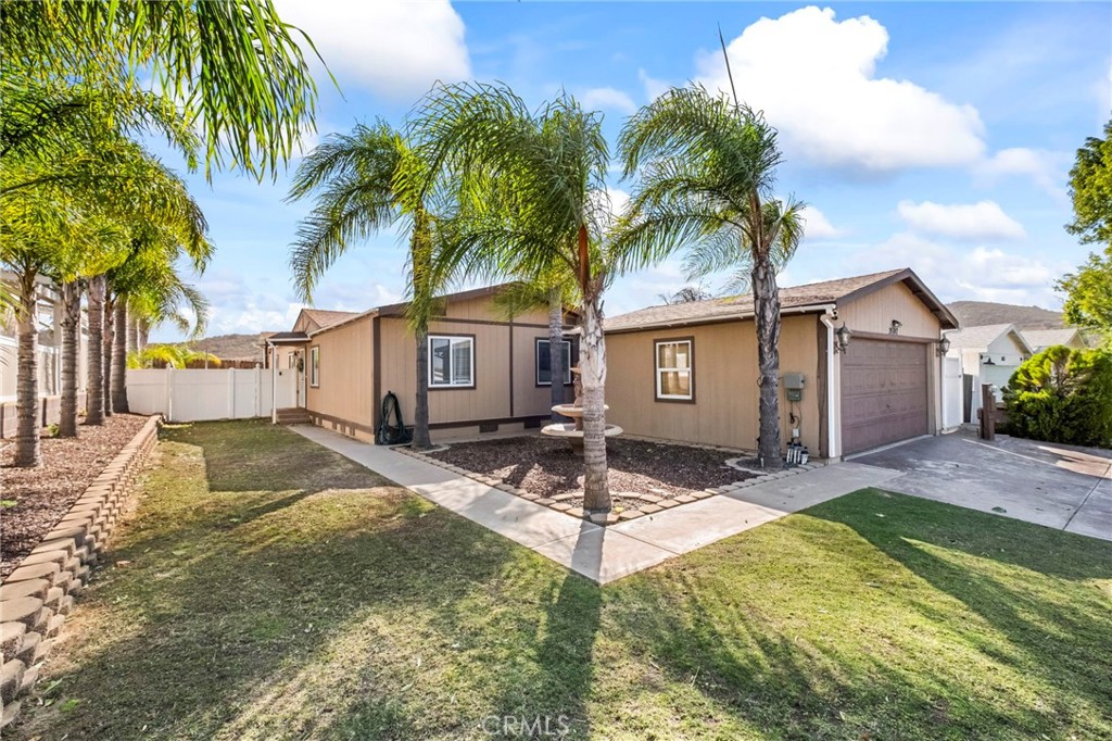 24847 Split Rail Road Wildomar, CA 92595 - Photo 45 of 45 a front view of house with yard and trees