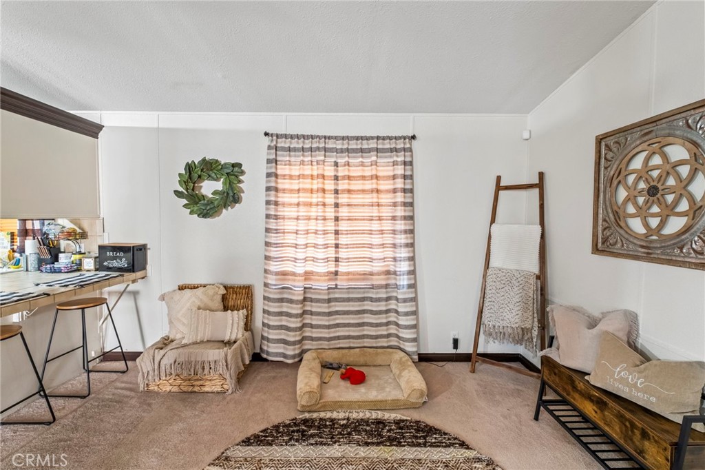 24847 Split Rail Road Wildomar, CA 92595 - Photo 10 of 45 a living room with furniture and a window