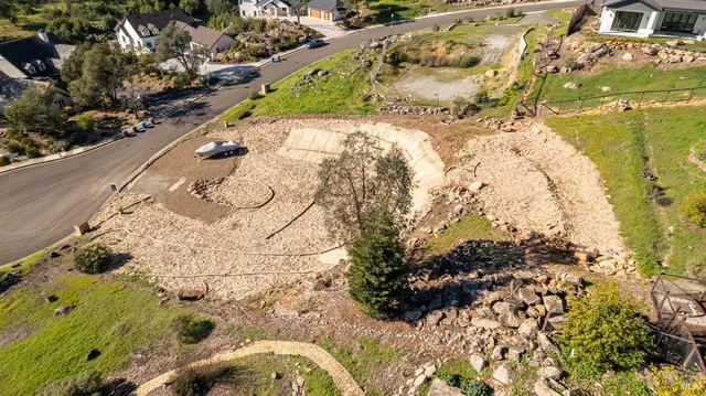 a view of swimming pool and mountain in the background