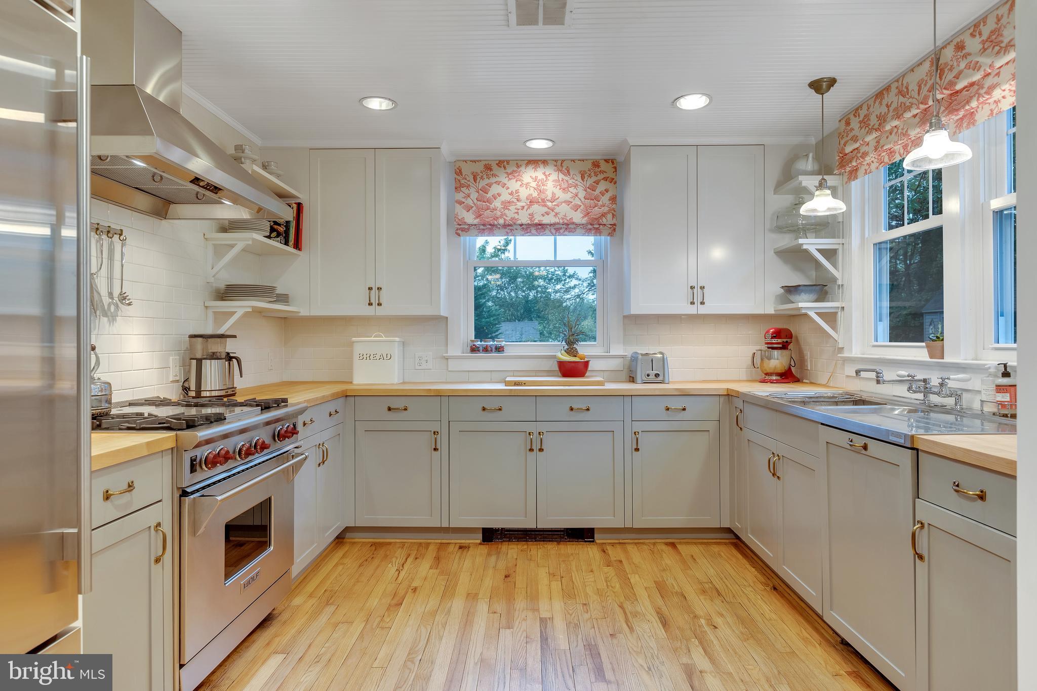 7506 Brookville Road Chevy Chase, MD 20815 - Photo 12 of 49 Gourmet Kitchen overlooking backyard