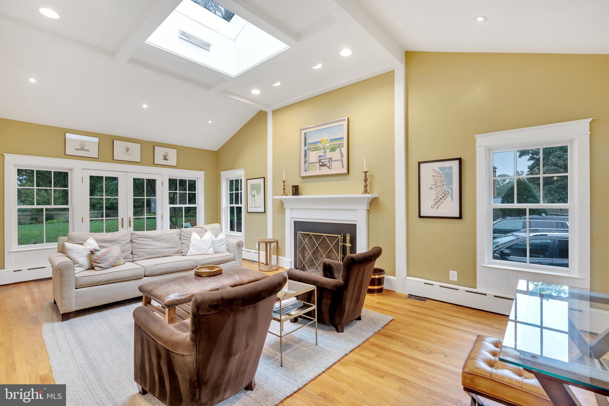 7506 Brookville Road Chevy Chase, MD 20815 - Photo 21 of 49 Family room with wood burning fireplace