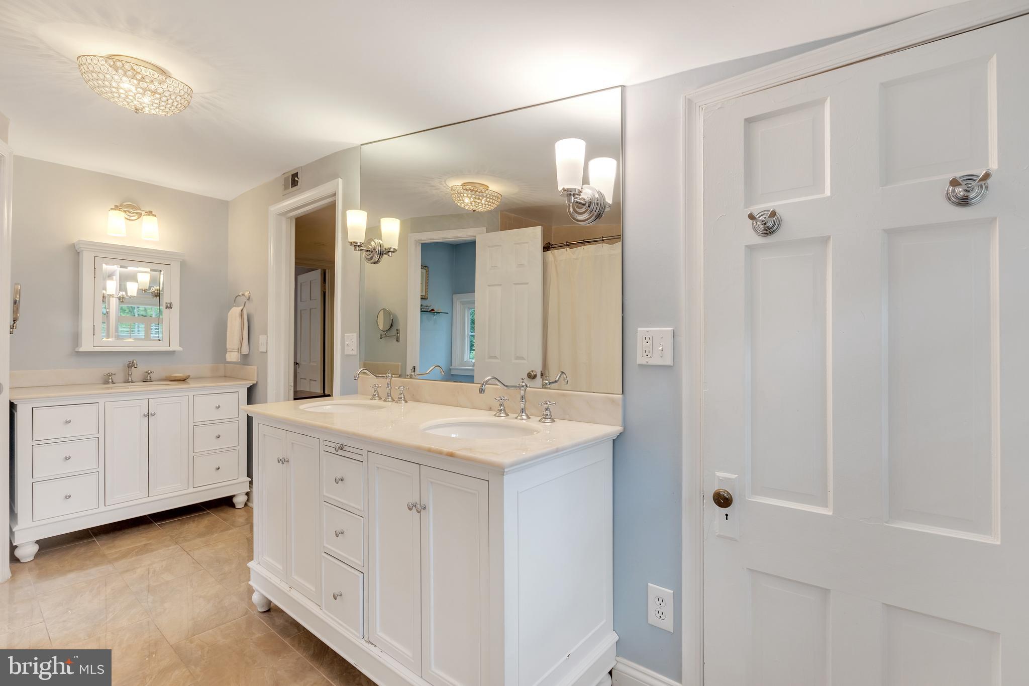 7506 Brookville Road Chevy Chase, MD 20815 - Photo 36 of 49 Third floor hall bath with three sinks