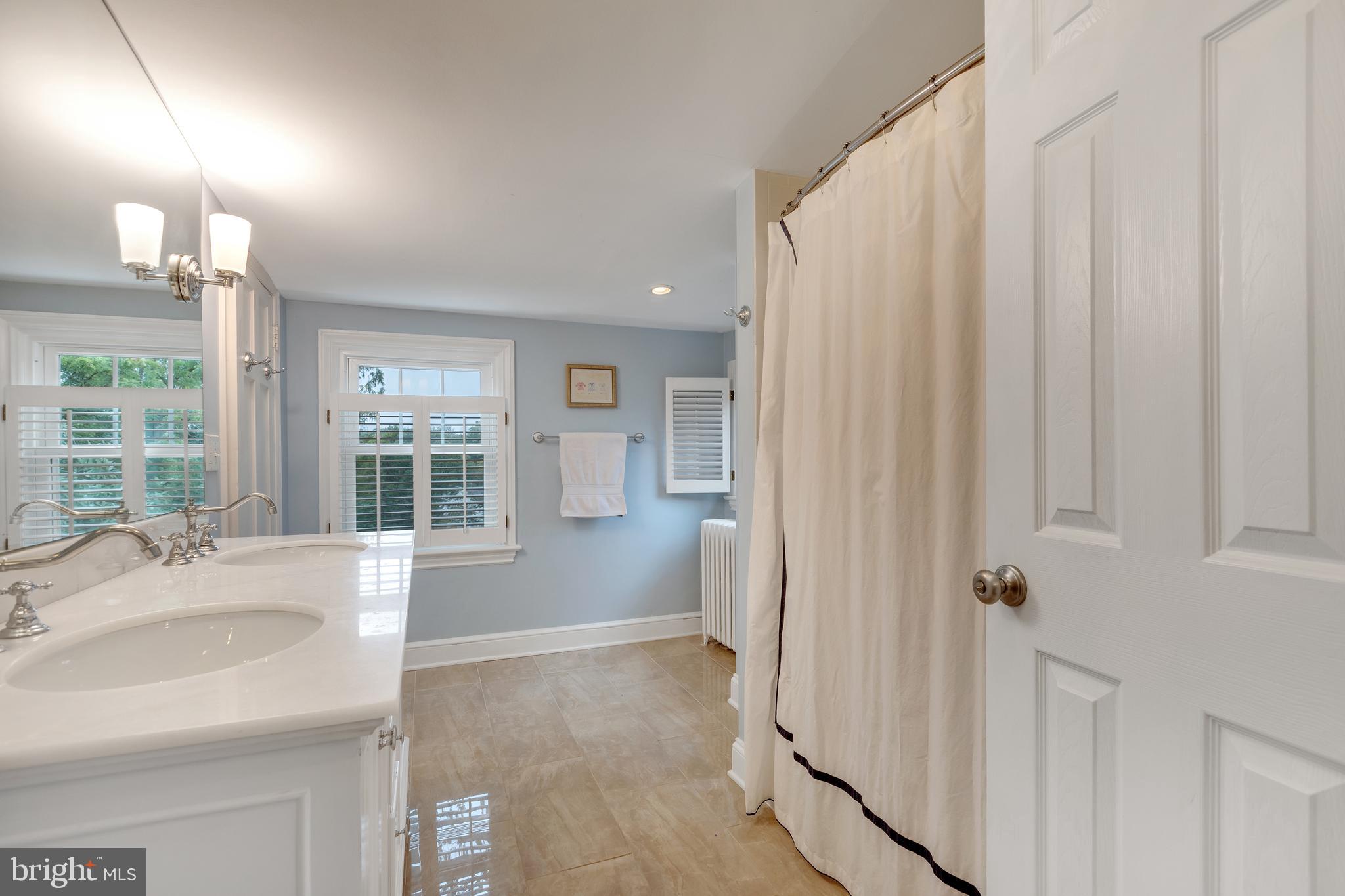 7506 Brookville Road Chevy Chase, MD 20815 - Photo 37 of 49 Third Floor hall bath with Tub/Shower