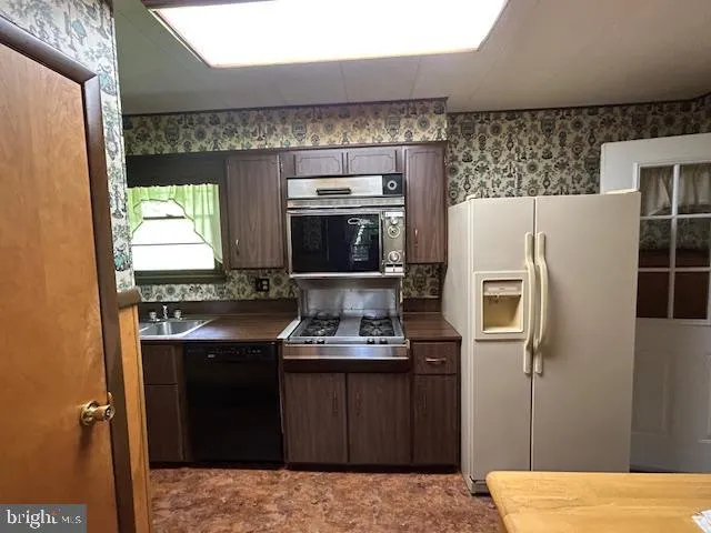 a bathroom with a toilet and a sink