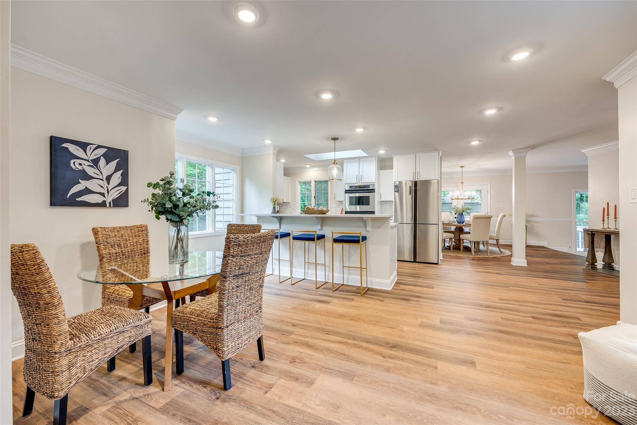 6 Sandy Cove Road Lake Wylie, SC 29710 - Photo 15 of 33 a dining room with furniture and wooden floor