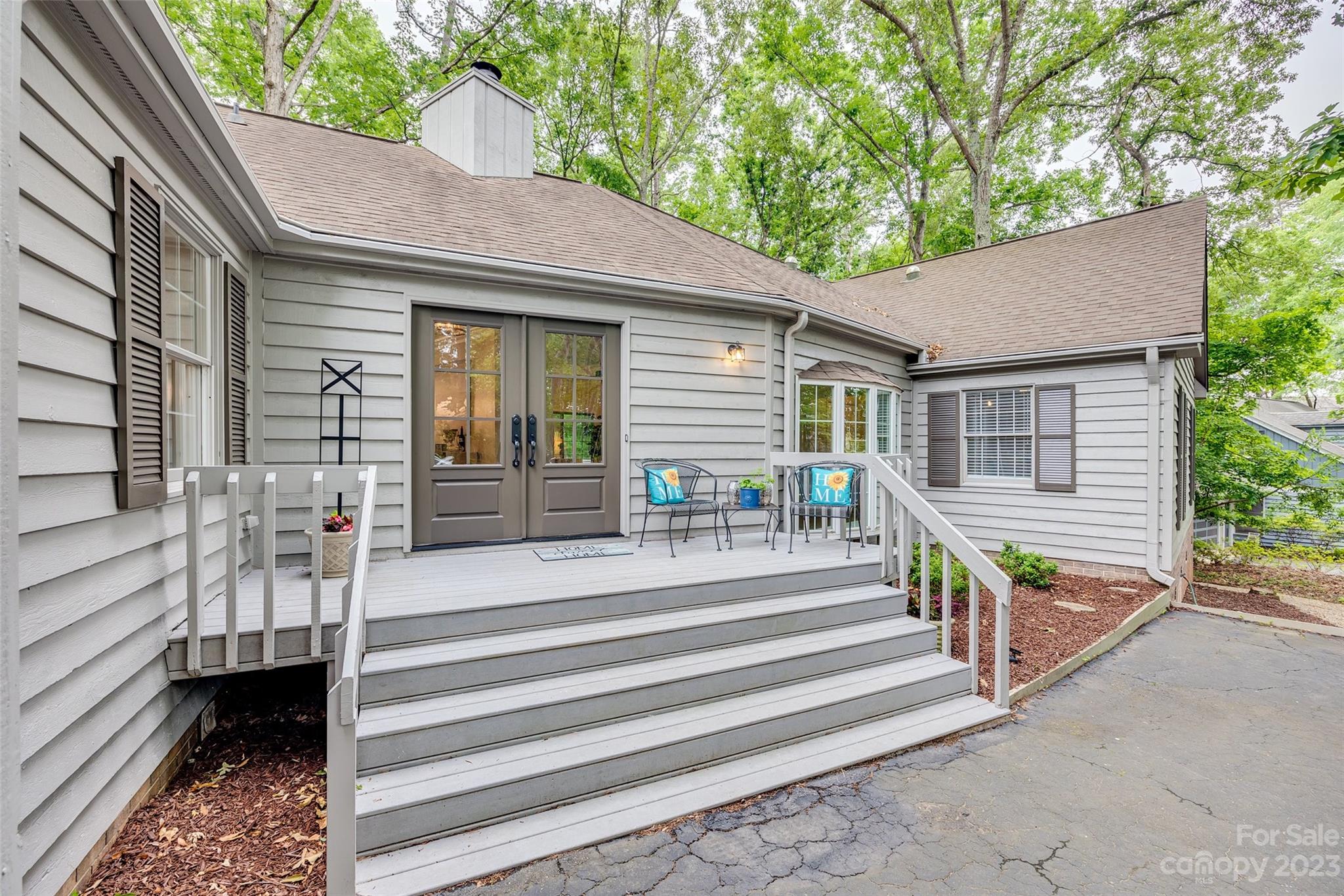 6 Sandy Cove Road Lake Wylie, SC 29710 - Photo 2 of 33 a view of a house with a window and stairs