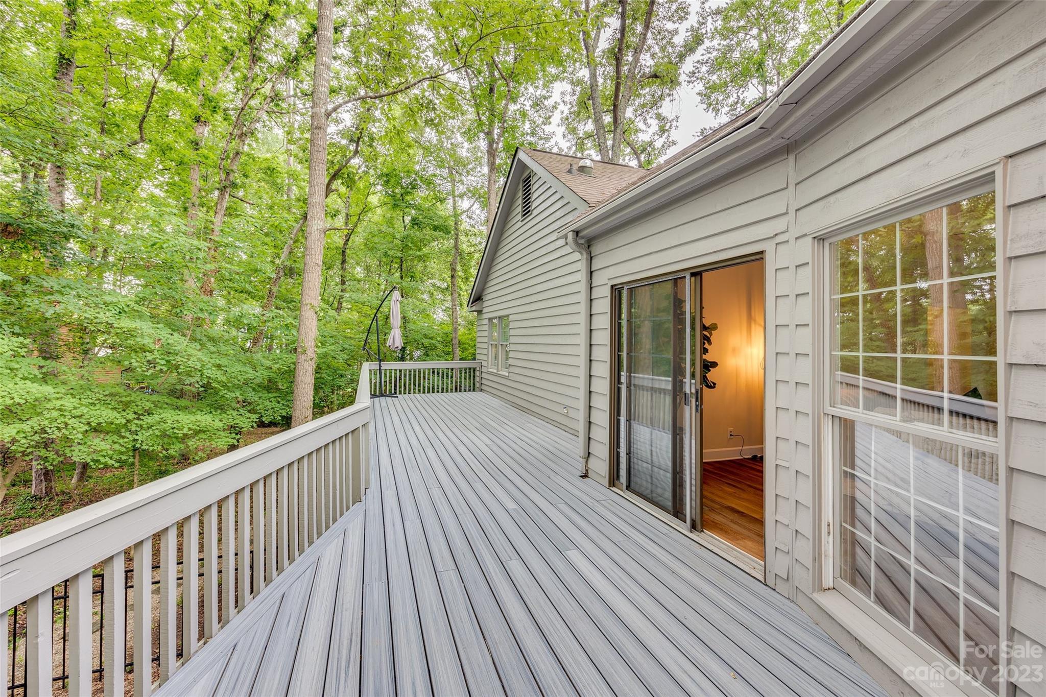 6 Sandy Cove Road Lake Wylie, SC 29710 - Photo 26 of 33 a view of a balcony with wooden floor and fence