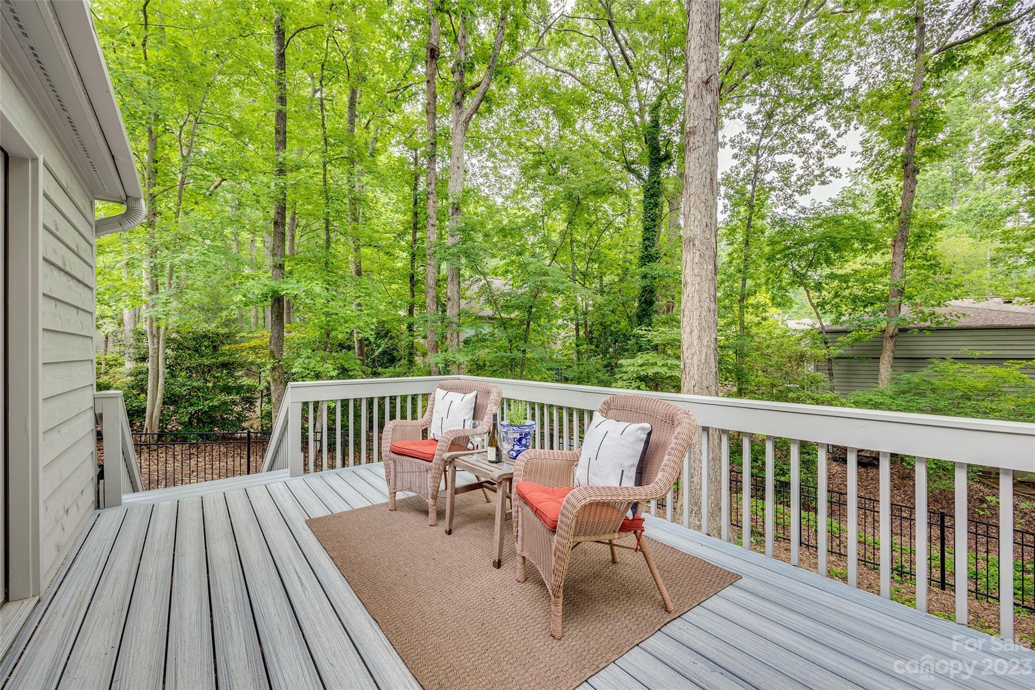 6 Sandy Cove Road Lake Wylie, SC 29710 - Photo 27 of 33 a view of balcony with furniture and trees around
