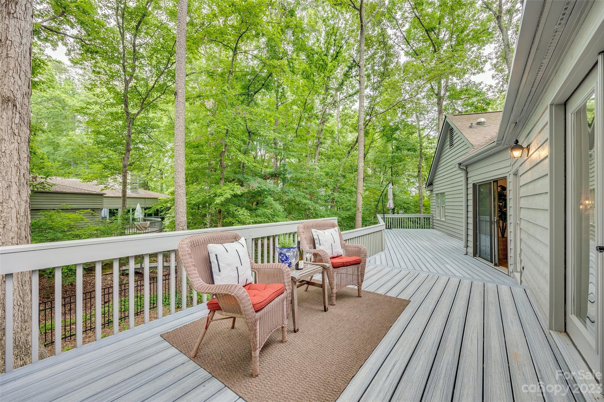 6 Sandy Cove Road Lake Wylie, SC 29710 - Photo 28 of 33 a view of a deck with furniture and a yard
