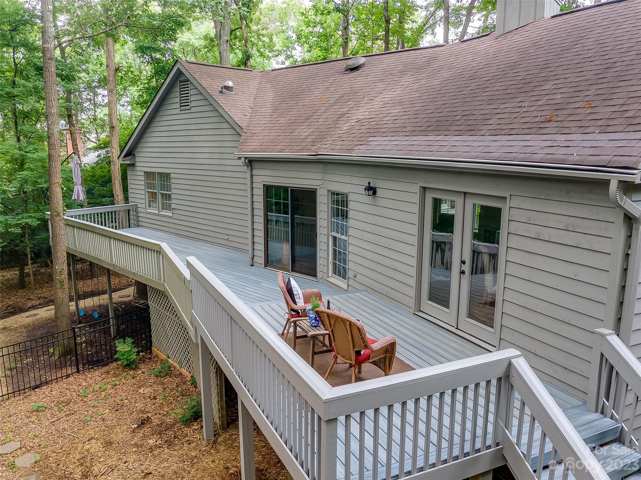 6 Sandy Cove Road Lake Wylie, SC 29710 - Photo 30 of 33 a balcony with table and chairs
