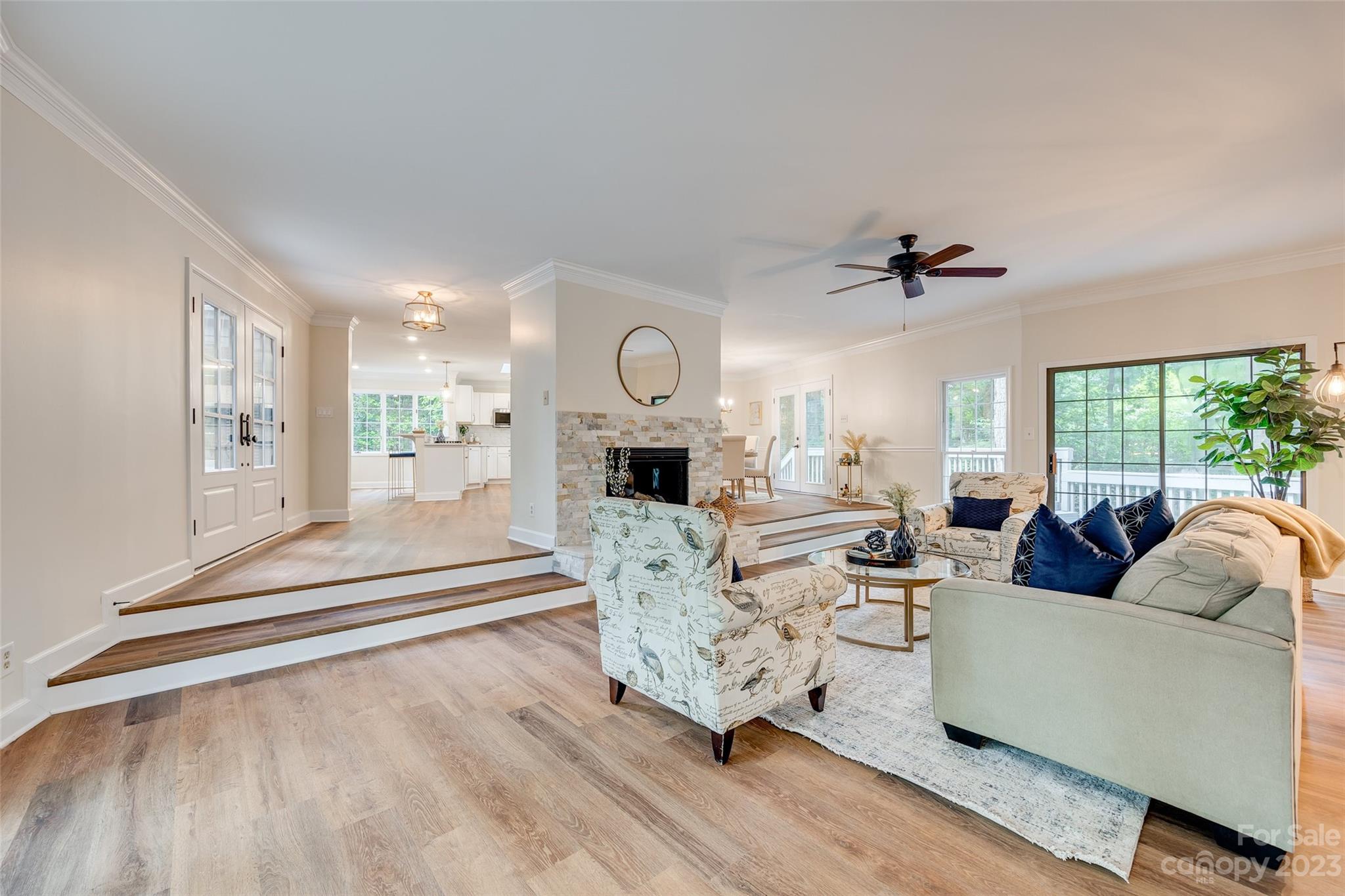 6 Sandy Cove Road Lake Wylie, SC 29710 - Photo 5 of 33 a living room with furniture fireplace and a large window