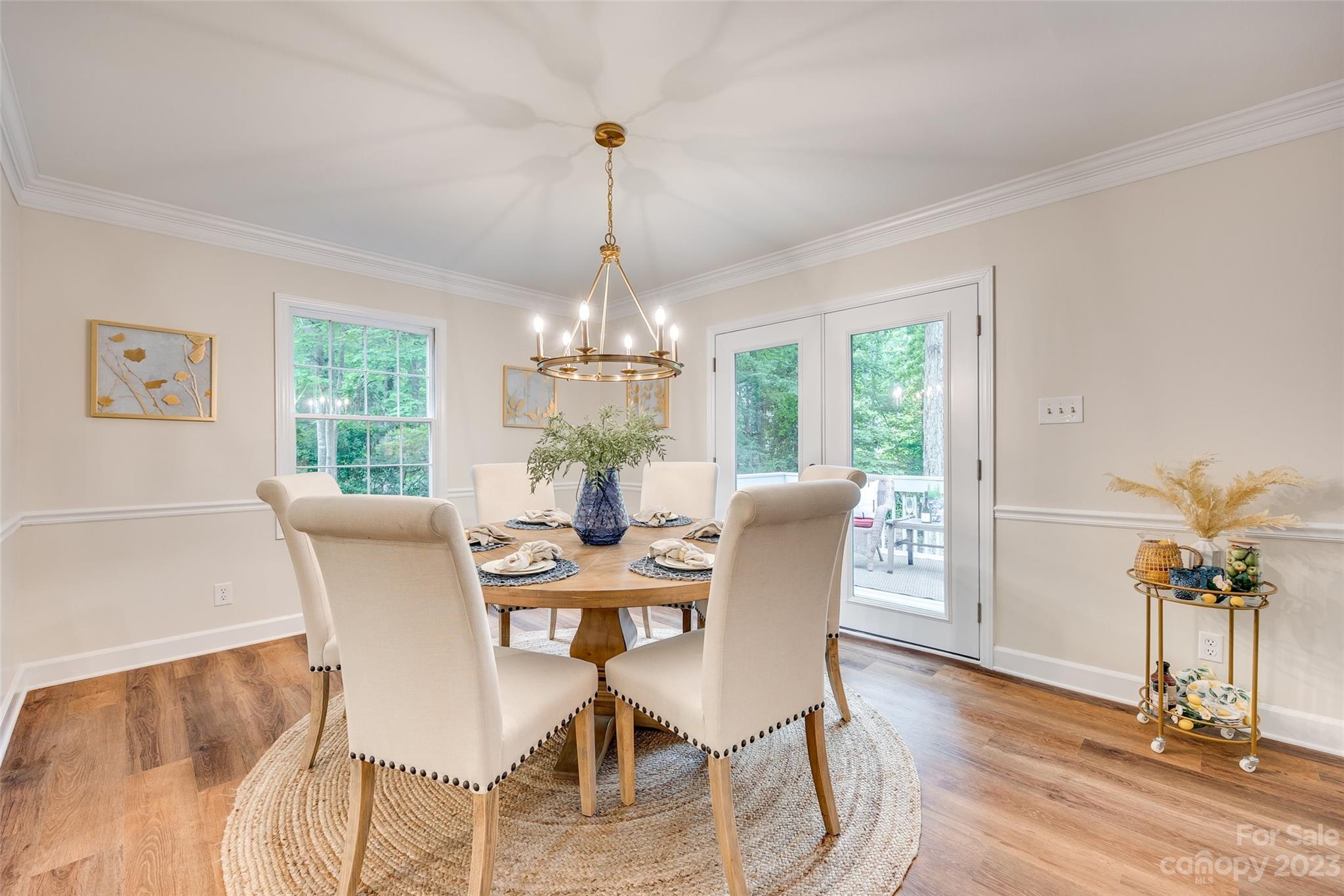 6 Sandy Cove Road Lake Wylie, SC 29710 - Photo 9 of 33 a view of a dining room with furniture window and wooden floor