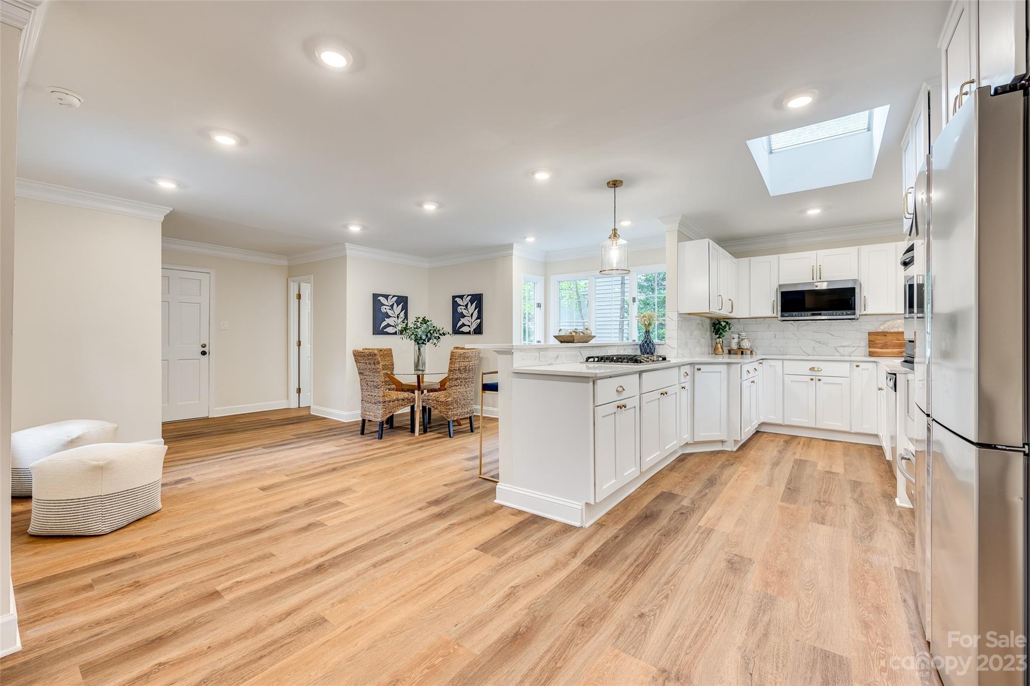 6 Sandy Cove Road Lake Wylie, SC 29710 - Photo 10 of 33 a large white kitchen with a large window