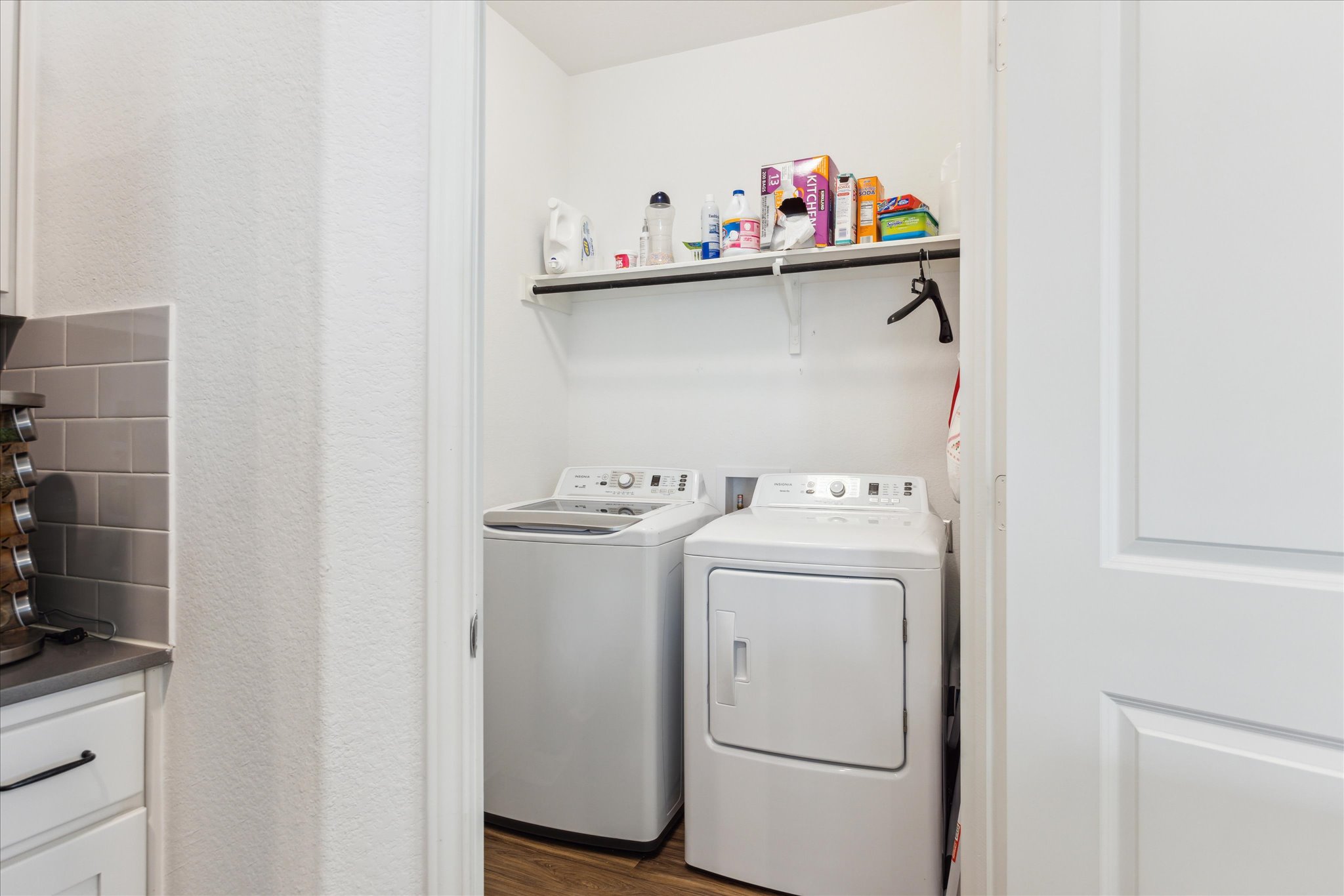 700 Legends Lane Georgetown, TX 78628 - Photo 23 of 31 Laundry area with separate washer and dryer and dark wood-style flooring