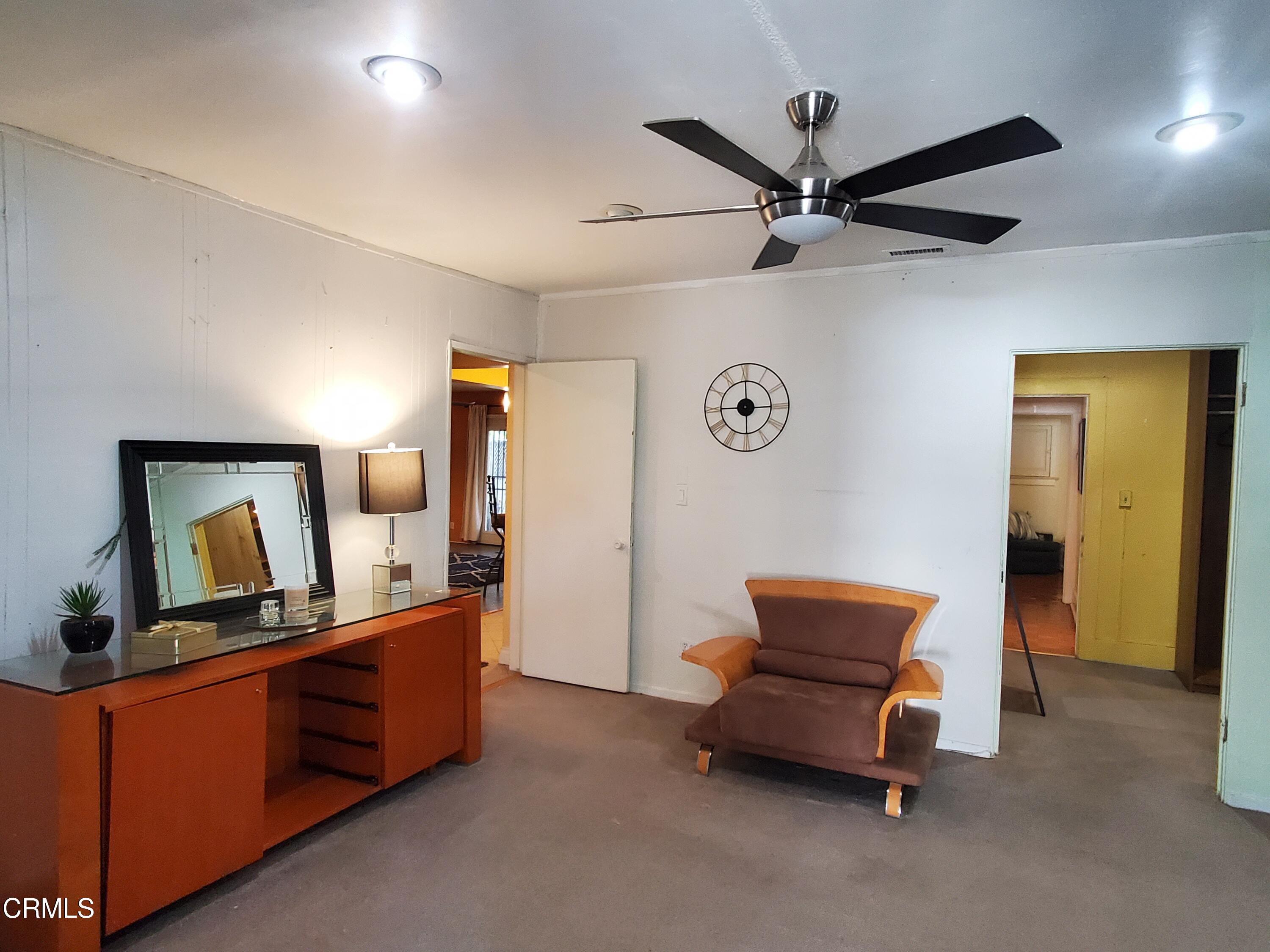905 Chapman Avenue Pasadena, CA 91103 - Photo 15 of 20 a room with furniture and a dresser