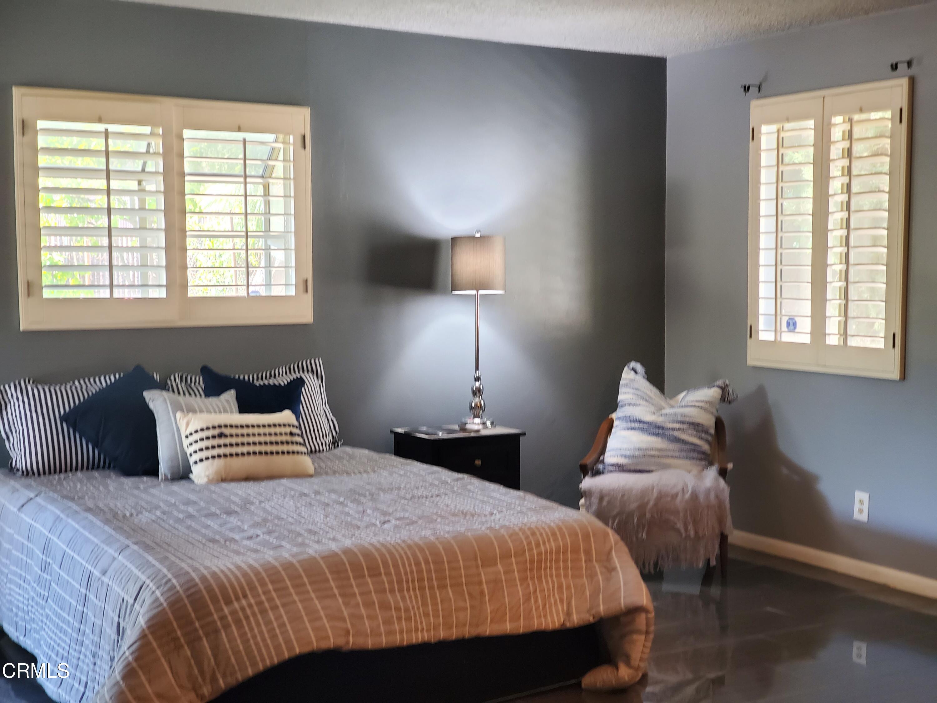 905 Chapman Avenue Pasadena, CA 91103 - Photo 16 of 20 a bedroom with bed and a window