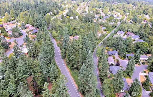 a view of a pathway with a yard
