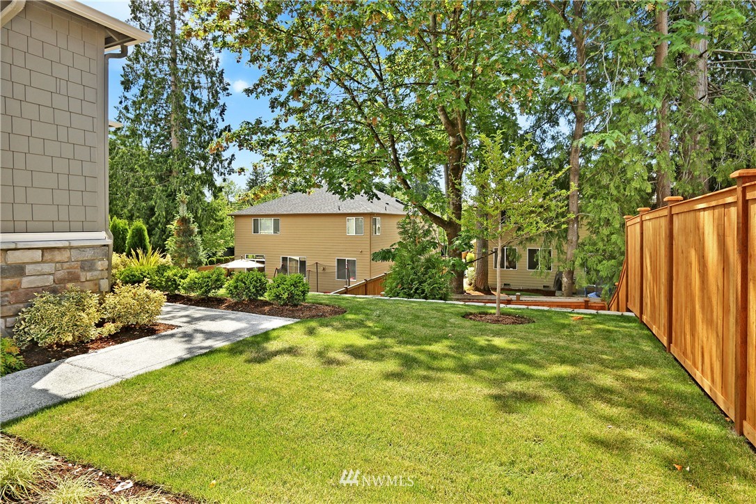 3304 219th Place Southeast, Unit 7 Bothell, WA 98021 - Photo 19 of 25 a house with swimming pool in front of it