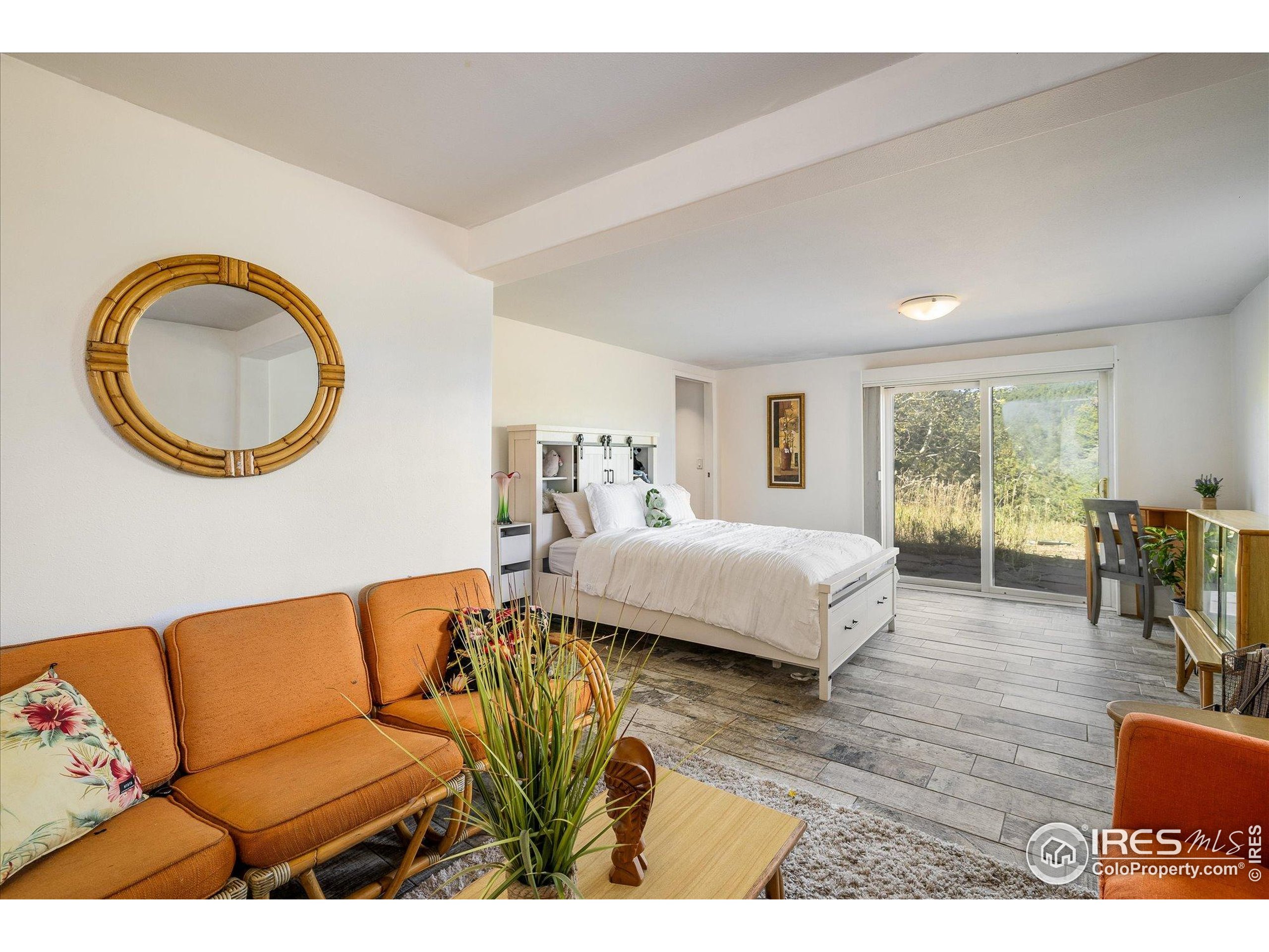 11935 Vonnie Claire Road Golden, CO 80403 - Photo 32 of 42 a living room with furniture and a window