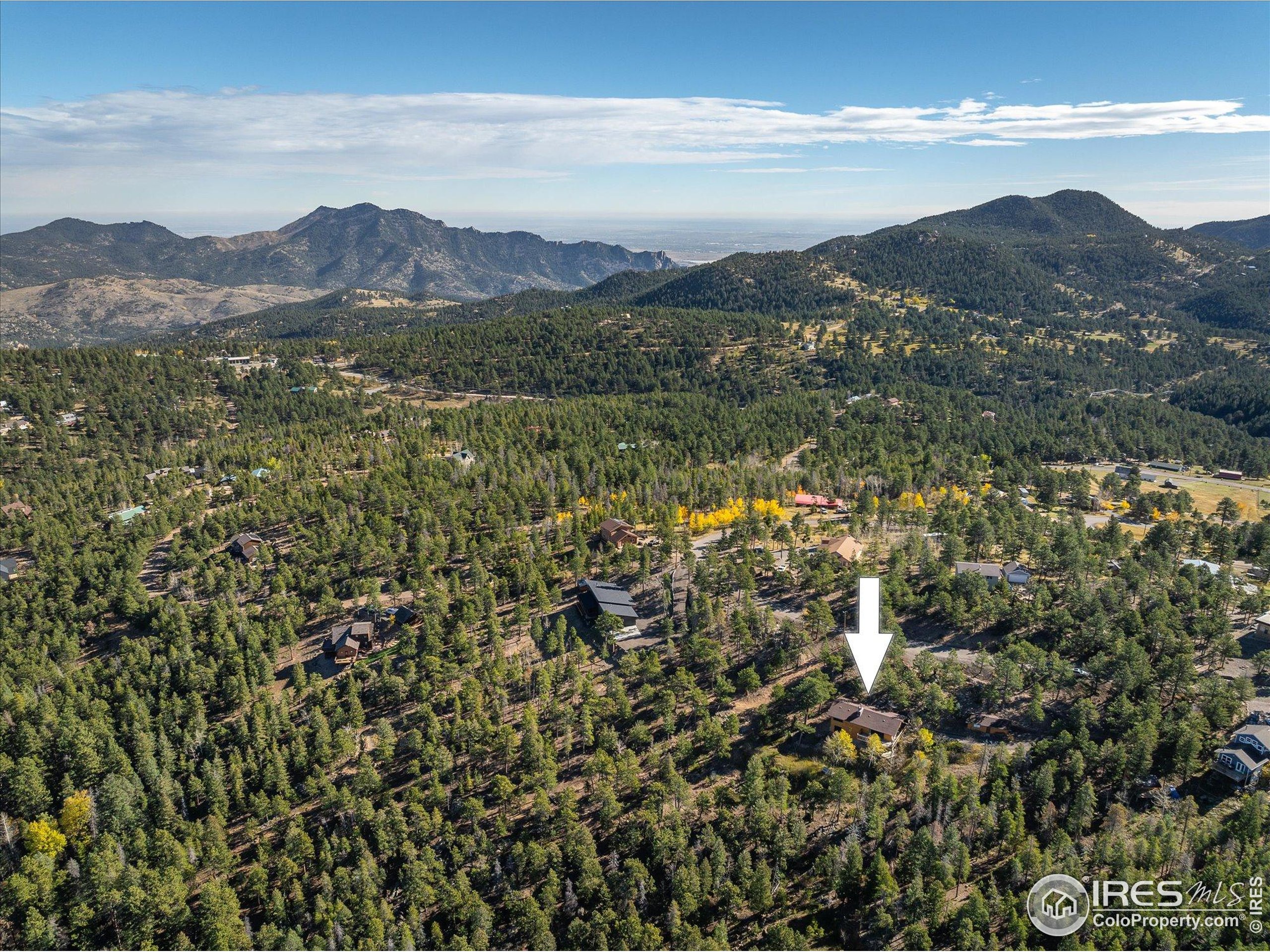 11935 Vonnie Claire Road Golden, CO 80403 - Photo 40 of 42 a view of a town with mountains in the background