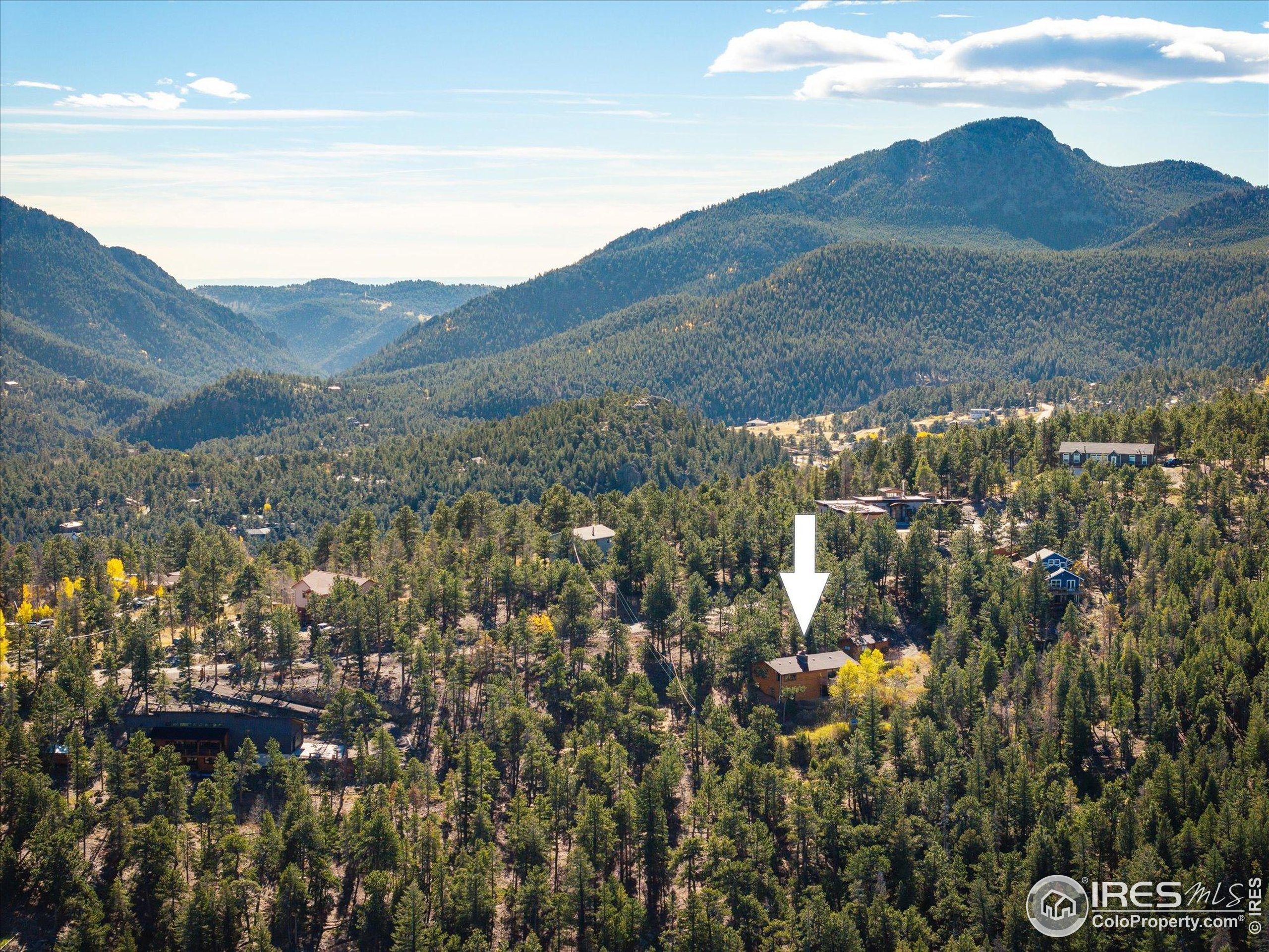 11935 Vonnie Claire Road Golden, CO 80403 - Photo 41 of 42 a view of a mountain in the distance