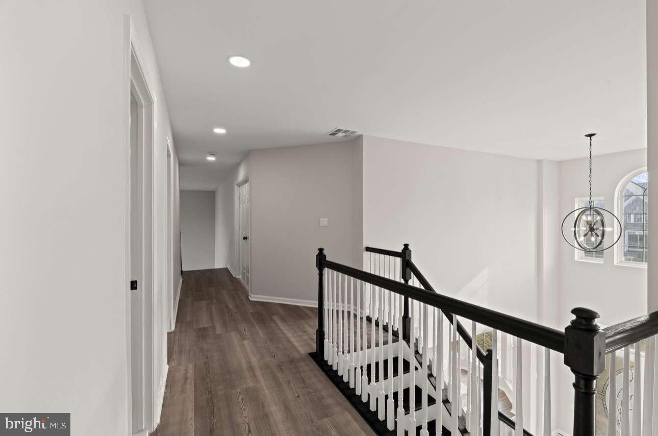 4 Box Turtle Lane Sicklerville, NJ 08081 - Photo 23 of 37 a view of hallway with wooden floor