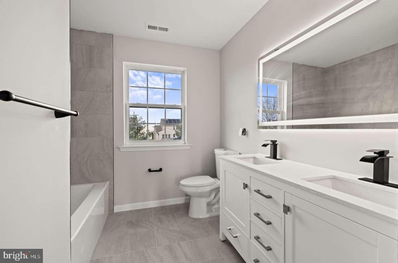 4 Box Turtle Lane Sicklerville, NJ 08081 - Photo 24 of 37 a bathroom with a sink toilet and shower