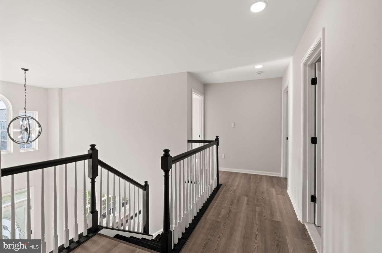 4 Box Turtle Lane Sicklerville, NJ 08081 - Photo 27 of 37 a view of a hallway with wooden floor