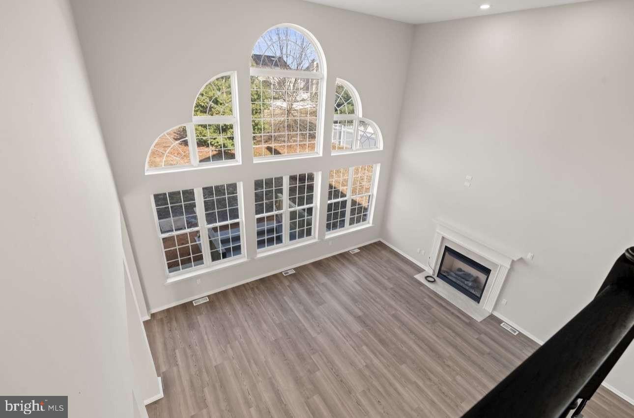 4 Box Turtle Lane Sicklerville, NJ 08081 - Photo 28 of 37 a view of wooden floor and windows in the room