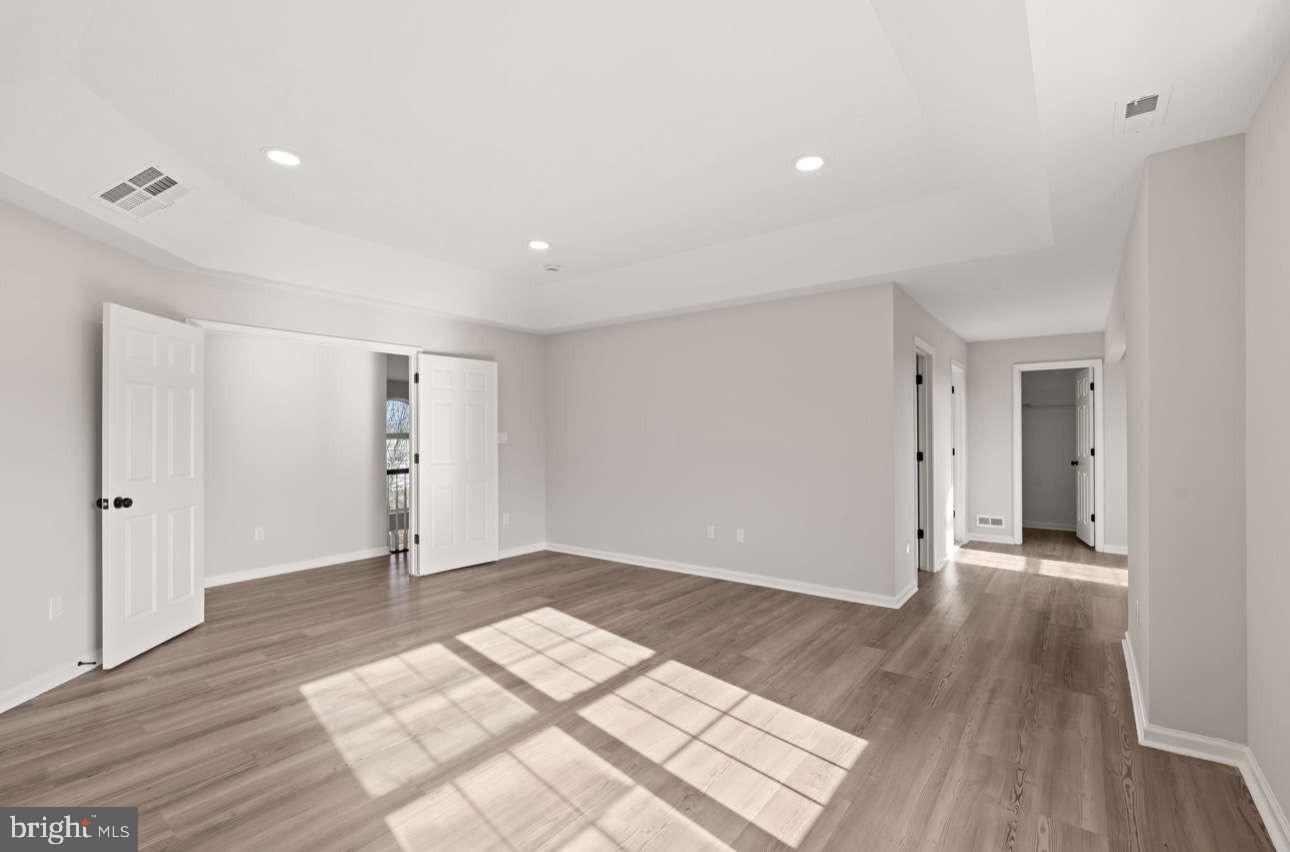 4 Box Turtle Lane Sicklerville, NJ 08081 - Photo 29 of 37 a view of an empty room with wooden floor