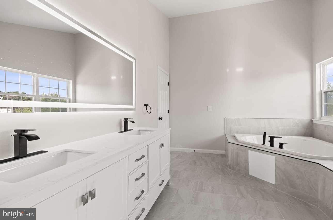 4 Box Turtle Lane Sicklerville, NJ 08081 - Photo 30 of 37 a kitchen with sink cabinets and microwave