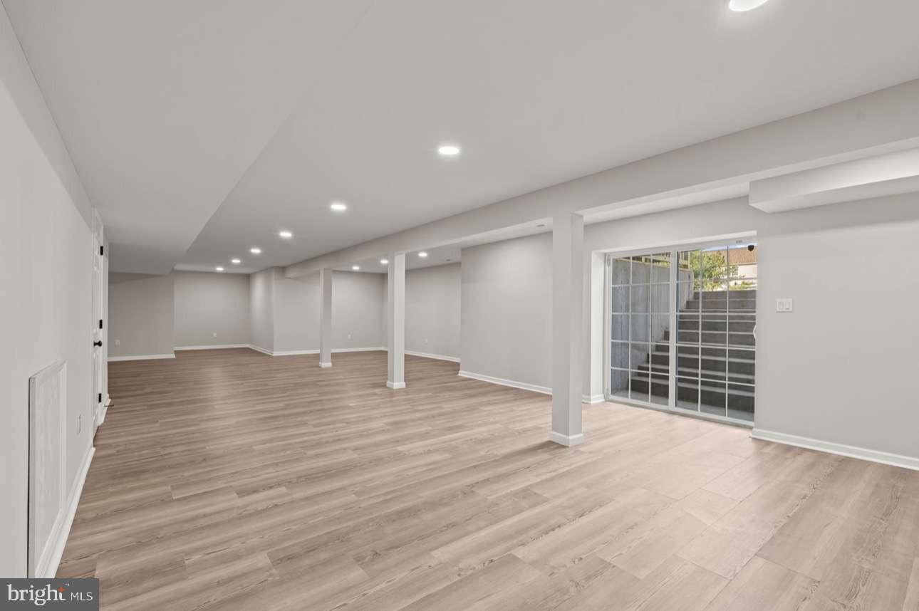 4 Box Turtle Lane Sicklerville, NJ 08081 - Photo 33 of 37 an empty room with wooden floor and windows