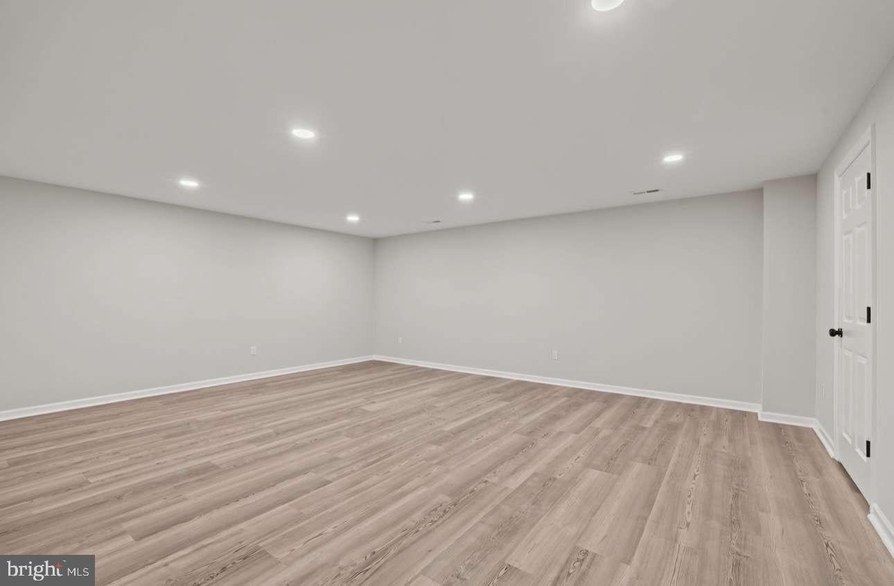 4 Box Turtle Lane Sicklerville, NJ 08081 - Photo 35 of 37 a view of empty room with wooden floor and fan