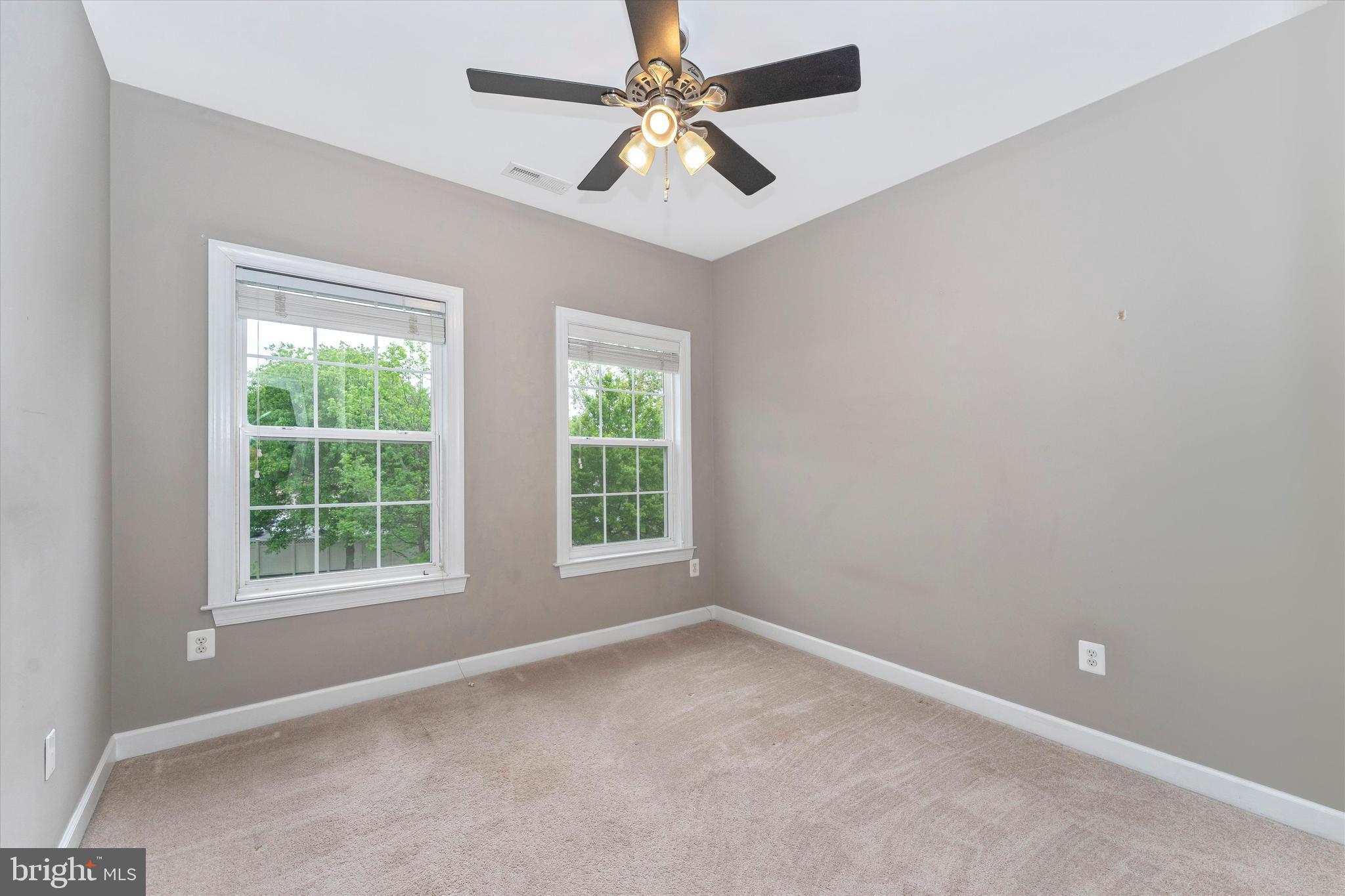 2305 Abby Road Edgewater, MD 21037 - Photo 14 of 36 Bedroom 3 with ceiling fan and large closet