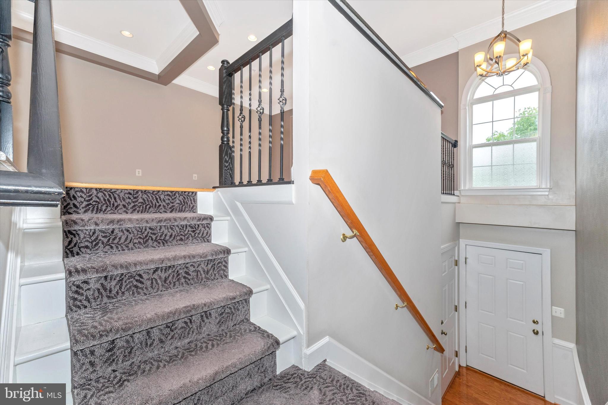 2305 Abby Road Edgewater, MD 21037 - Photo 2 of 36 Dual staircase leading to lower level & garage