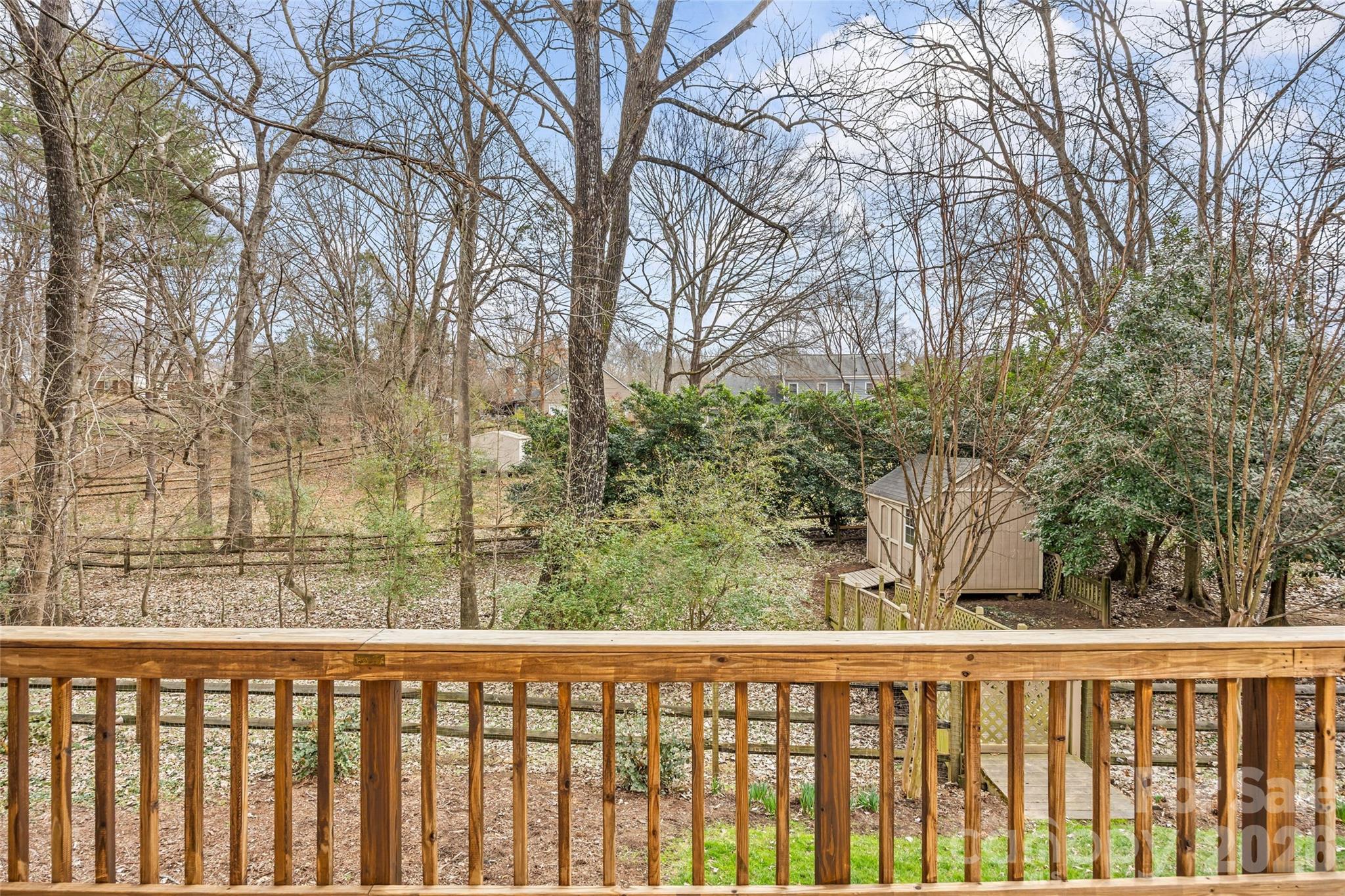 9619 Radner Lane Charlotte, NC 28277 - Photo 37 of 44 a view of a wooden fence and trees