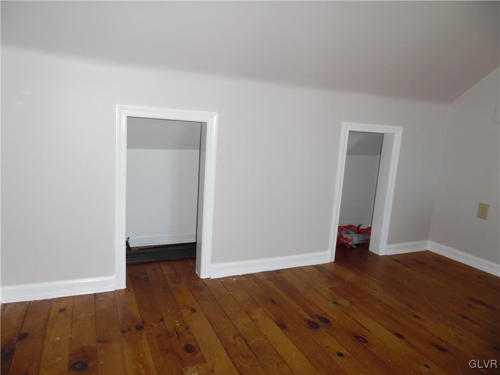 223 East Raspberry Street Bethlehem, PA 18018 - Photo 18 of 20 an empty room with wooden floor and closet