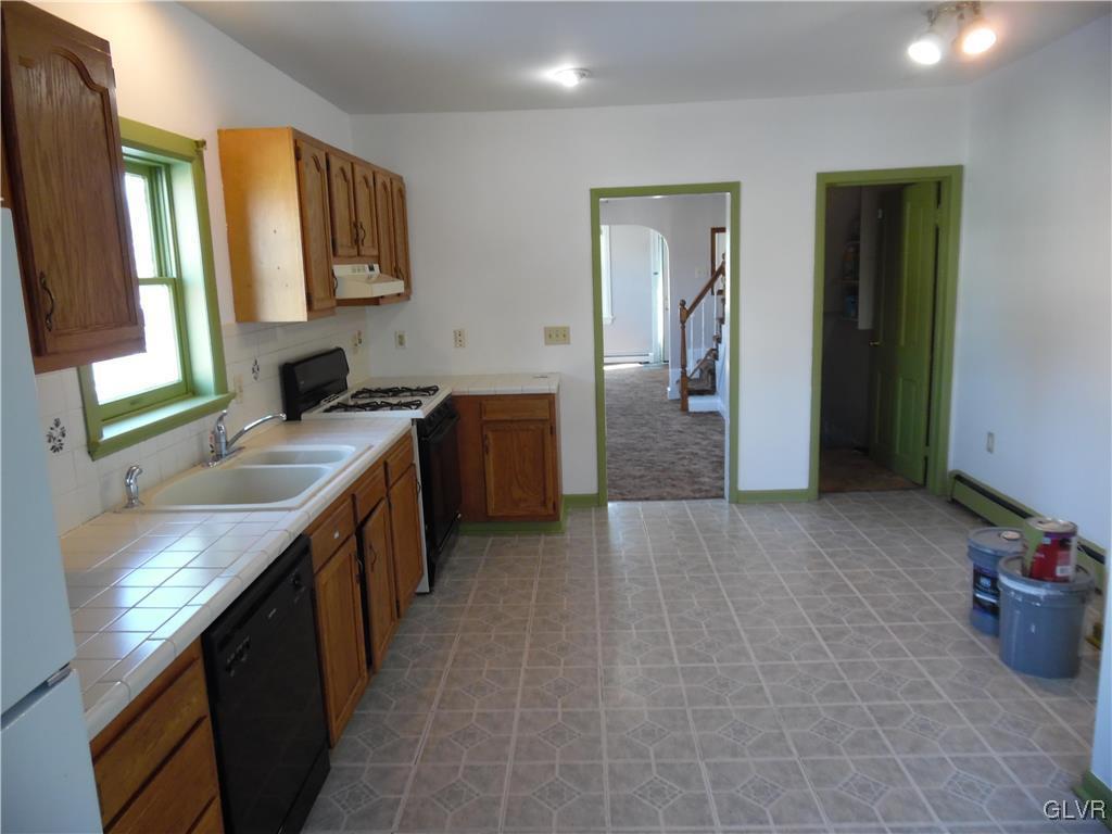 223 East Raspberry Street Bethlehem, PA 18018 - Photo 7 of 20 a kitchen with a sink cabinets and window