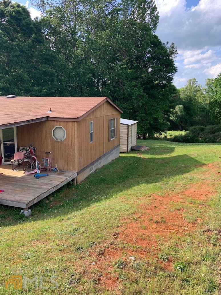 45 North Villa Road Villa Rica, GA 30180 - Photo 1 of 1 a view of a backyard with furniture and garden