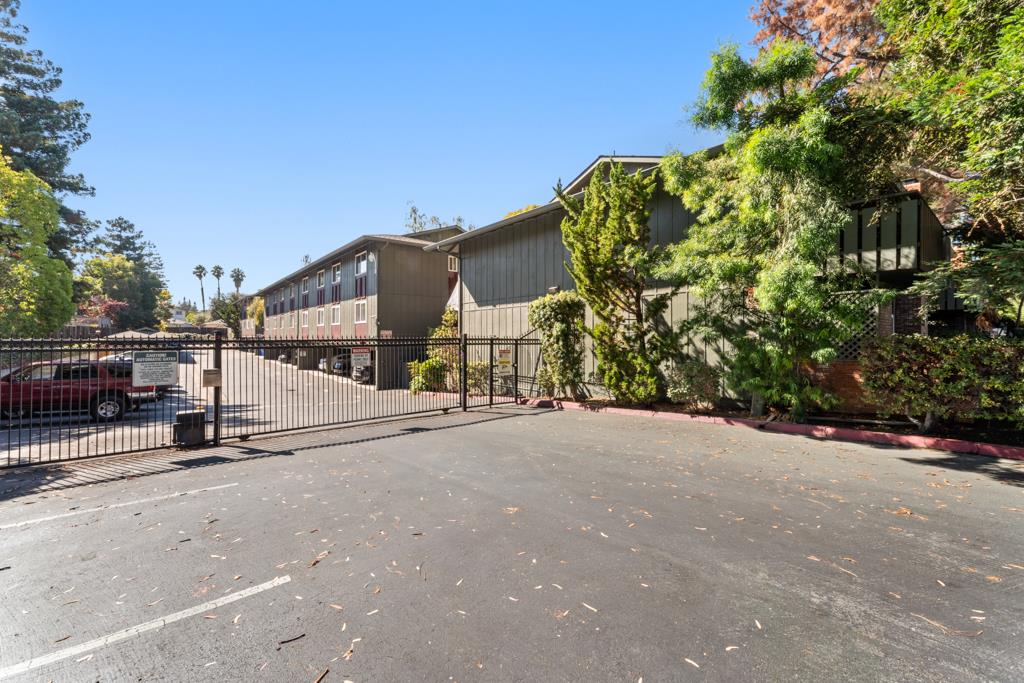 99 East Middlefield Road, Unit 41 Mountain View, CA 94043 - Photo 32 of 37 a view of a street with a building in the background