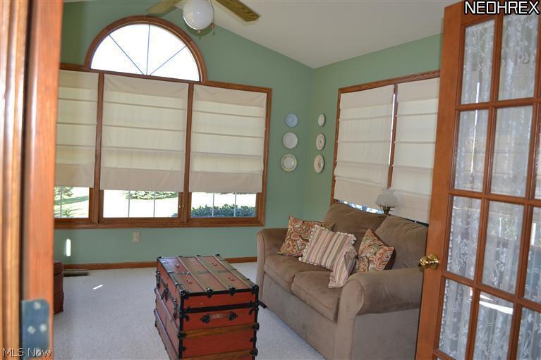 3989 Batdorf Road Wooster, OH 44691 - Photo 10 of 25 Four season sun room makes for a wonderful family room and a great spot to enjoy the beautiful sunsets.