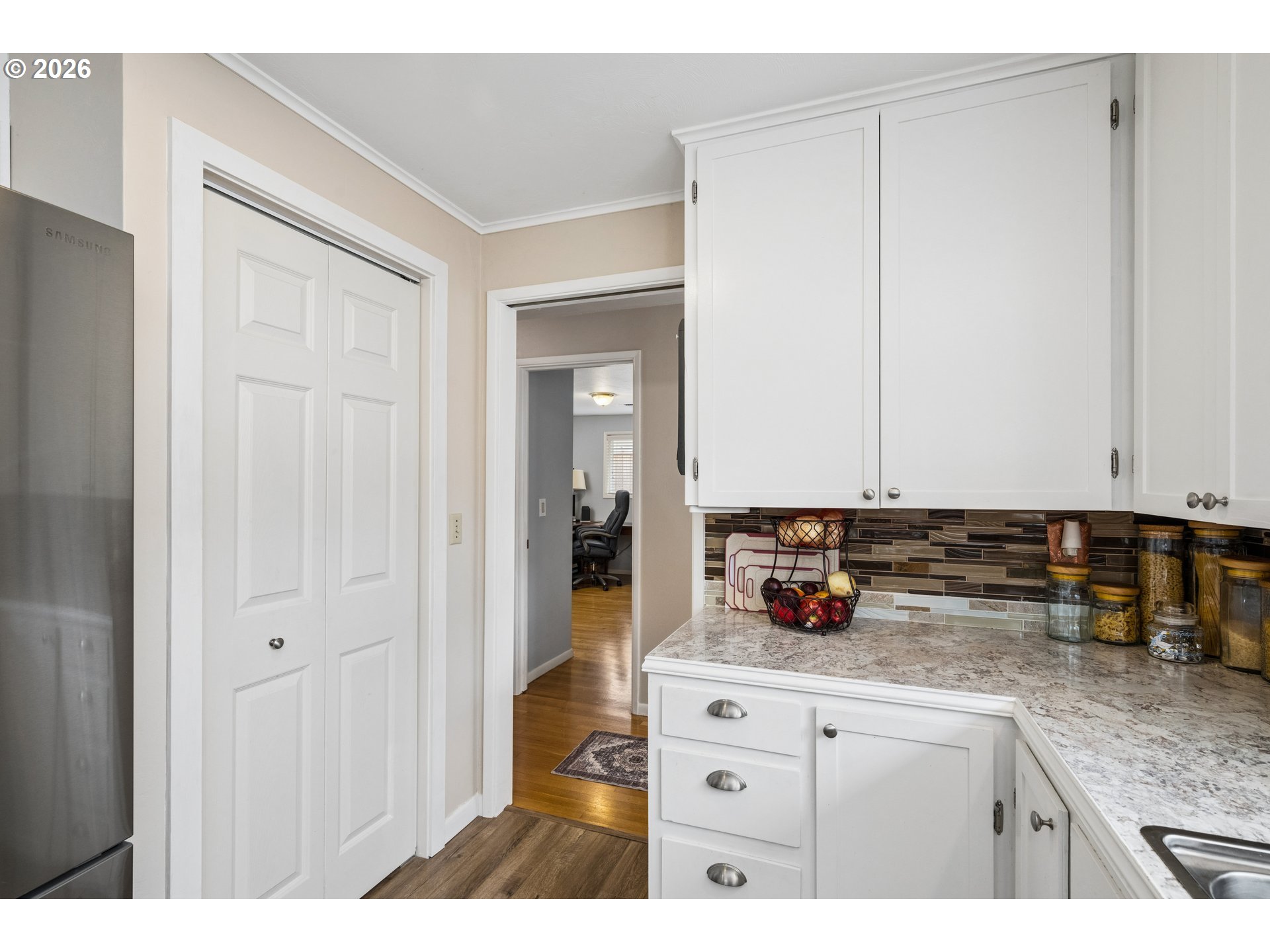 420 Riverview Boulevard Springfield, OR 97477 - Photo 11 of 28 a kitchen with cabinets appliances and a counter top