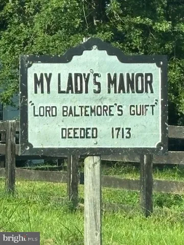 a sign broad on the wooden wall