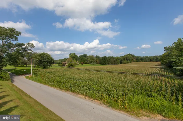 a view of a lake with a big yard