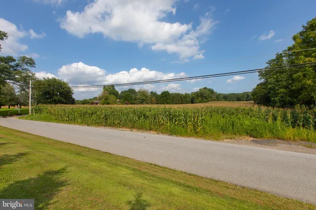 a view of a lake with a big yard