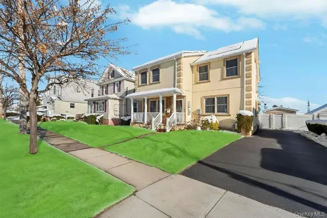 a view of a building with a yard