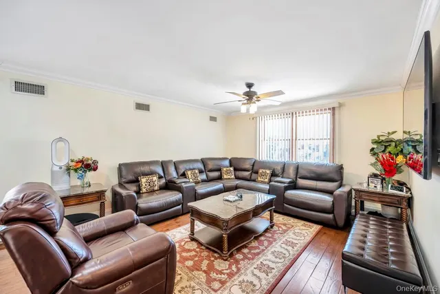 a living room with furniture or couch and a window